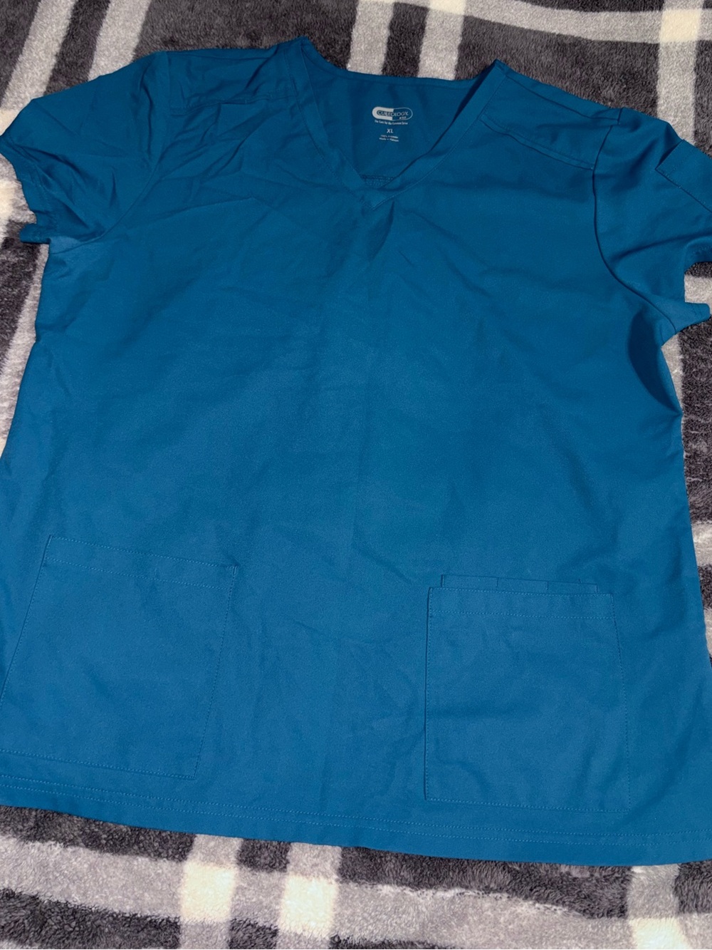 Women’s Cureology by Koi Scrub Top in Teal Blue